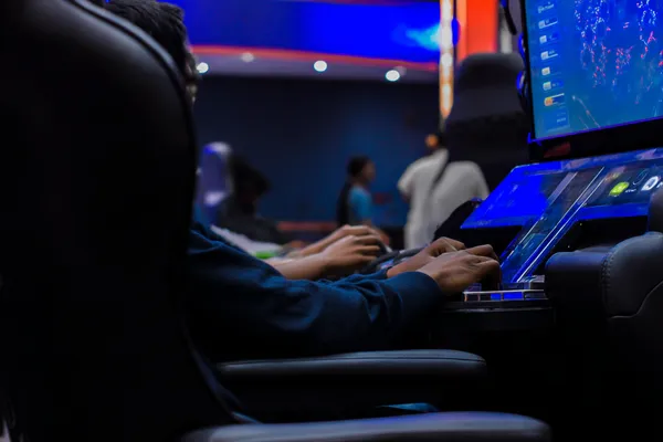 ZBZBET Jackpot Slots — Spin for massive rewards A dramatic shot of winning sevens landing on a slot reel surrounded by shining gold coins, symbolizing big wins.